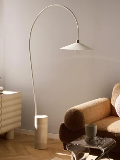 Lampada ad arco con base in travertino Cora